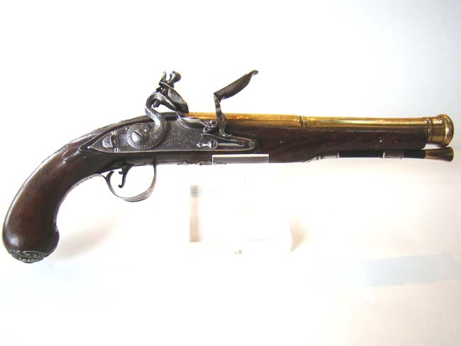 A Revolutionary War period silver mounted brass barreled flintlock Naval officer's pistol — image 11